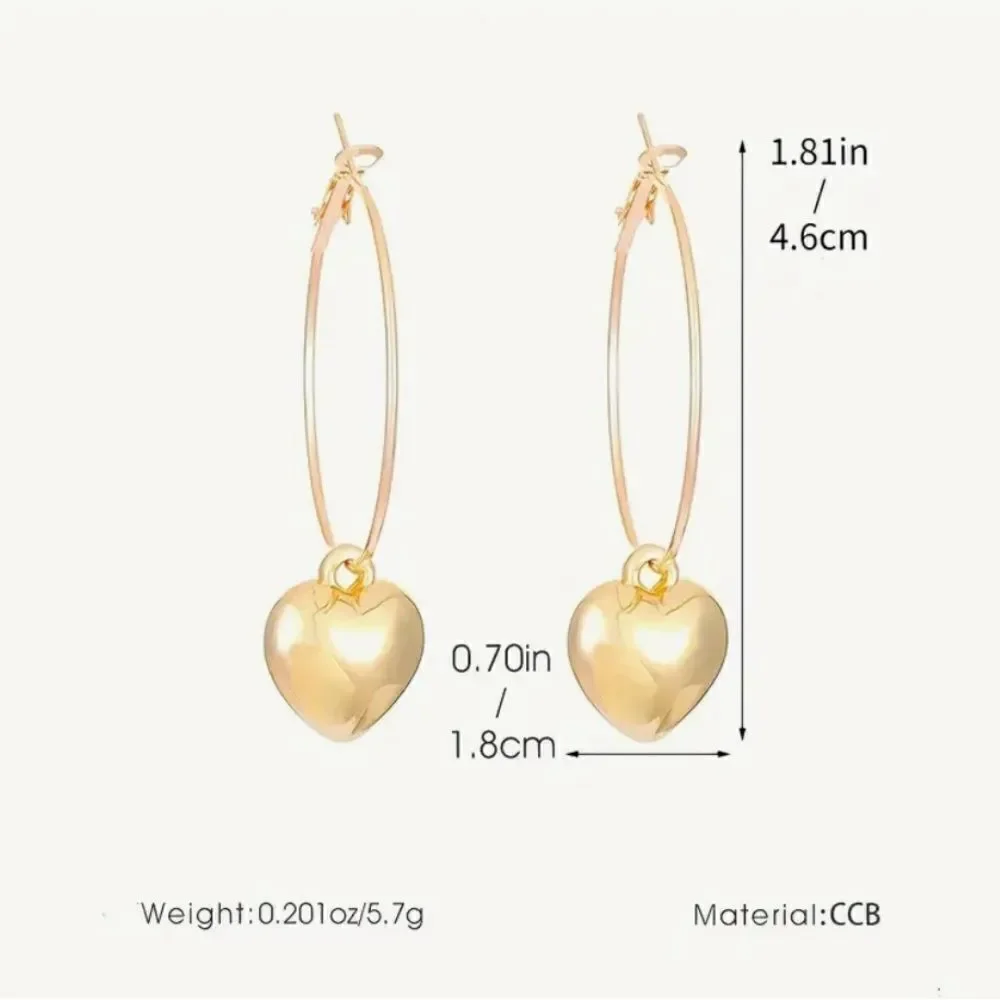 💛 Beautiful goldtone hoops with puffy gold hearts 💛